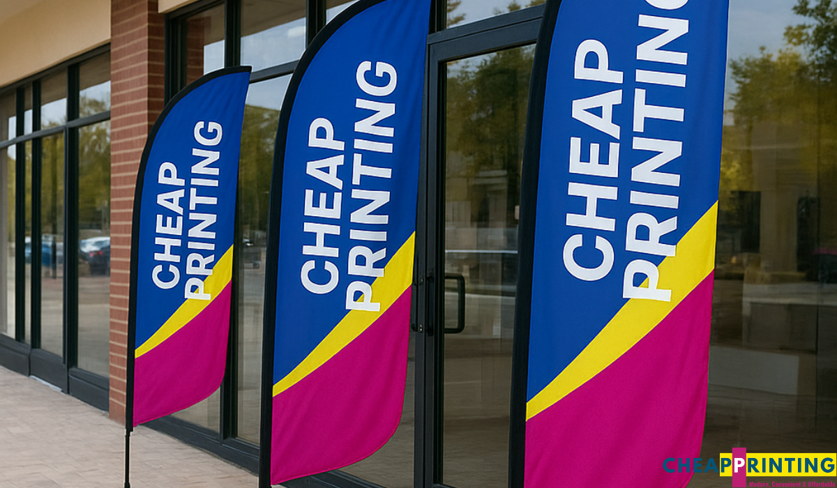 Flags waving outside a shop and event, featuring branded designs for promotional flags printing.
